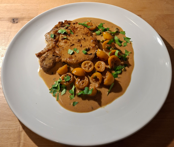 Koteletts mit beschwipsten Kumquats