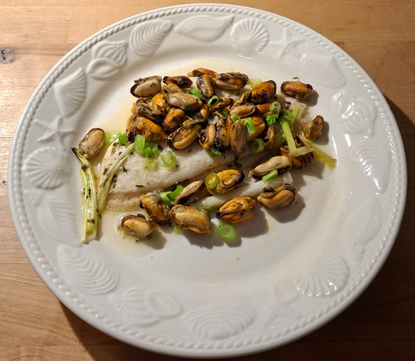 Schollenfilets mit Muscheln